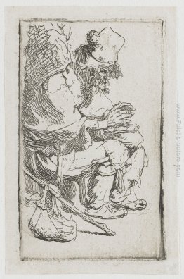 Mendicante seduto scaldandosi le mani alla scaldavivande Mendicante seduto scaldandosi le mani alla scaldavivande