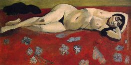 Dormire nudo su uno sfondo rosso