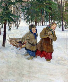 Bambini che trasportano il legno nella neve, inverno