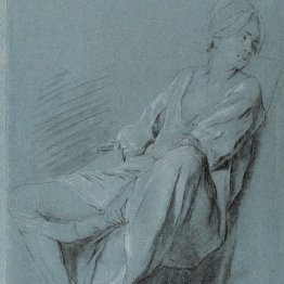 Sitzende junge Frau im Hemd