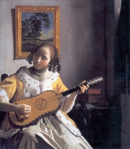 Donna di Youg suonare una chitarra Donna di Youg suonare una chitarra