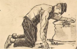 L'uomo Mettere le patate in un sacco L'uomo Mettere le patate in un sacco
