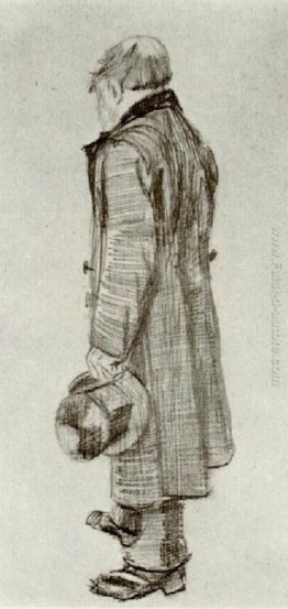 L'uomo orfano Holding TOP cappello in mano L'uomo orfano Holding TOP cappello in mano
